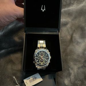 Bulova, Two-tone Gold and Silver, beautiful shape, unique chronograph look.